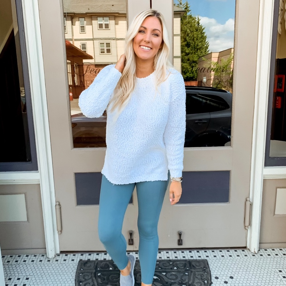 White fuzzy sweater